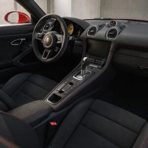 Interior of Porsche 718 Boxster GTS 4.0 with Alcantara seats and red stitching